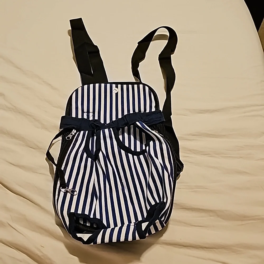 New without tags puppy/kitty forward facing carrier. New condition.